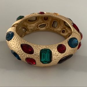 Gold bangle with multi colored stones